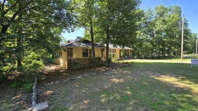 Welcome to market this Charming 3-bedroom, 2-bath home located on Indian Hills Country Club in Arkansas - for sale on GolfHomes.com, golf home, golf lot
