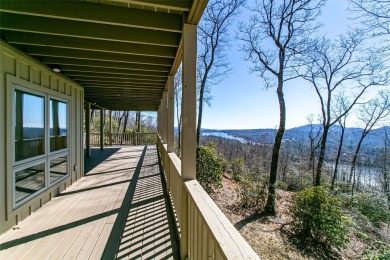 Discover your mountain retreat offering sweeping views of Lake on Lake Toxaway Country Club in North Carolina - for sale on GolfHomes.com, golf home, golf lot