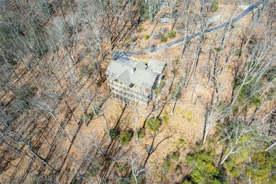 Discover your mountain retreat offering sweeping views of Lake on Lake Toxaway Country Club in North Carolina - for sale on GolfHomes.com, golf home, golf lot