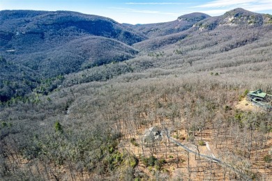 Discover your mountain retreat offering sweeping views of Lake on Lake Toxaway Country Club in North Carolina - for sale on GolfHomes.com, golf home, golf lot