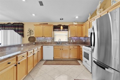 BOND PAID, MOSTLY FURNISHED, NEWER ROOF 2021, NO CARPET, BLOCK on The Links of Spruce Creek in Florida - for sale on GolfHomes.com, golf home, golf lot