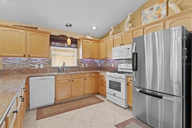 BOND PAID, MOSTLY FURNISHED, NEWER ROOF 2021, NO CARPET, BLOCK on The Links of Spruce Creek in Florida - for sale on GolfHomes.com, golf home, golf lot