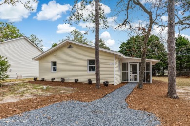 Renovated home with 2 Screened porches!  Enjoy this single-story on Founders Club At St. James Plantation in North Carolina - for sale on GolfHomes.com, golf home, golf lot