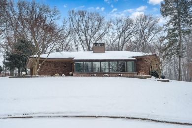 OPEN HOUSE CANCELED --set amidst mature landscaping, featuring on The Moors Golf Club in Michigan - for sale on GolfHomes.com, golf home, golf lot