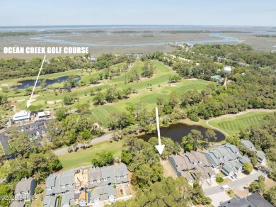 This beautiful lot overlooking the 16th fairway on the Ocean on Ocean Creek Golf Course in South Carolina - for sale on GolfHomes.com, golf home, golf lot