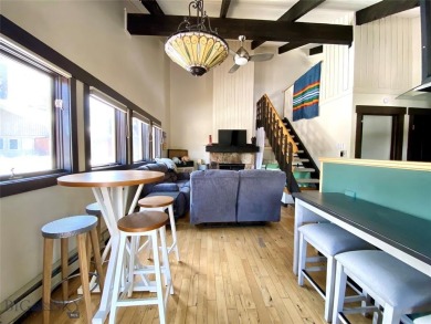 Charming and well-maintained end-unit condo featuring a cozy on Big Sky of Montana Golf Course in Montana - for sale on GolfHomes.com, golf home, golf lot