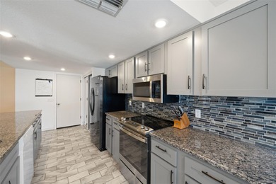 Desirable Oakmont model featuring an open, spacious floor plan on Timber Pines Golf Course in Florida - for sale on GolfHomes.com, golf home, golf lot