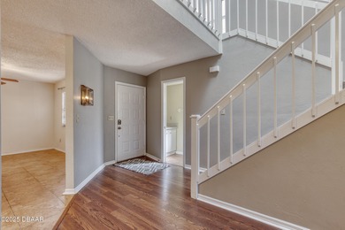 This beautifully updated townhouse offers the perfect blend of on The Club At Pelican Bay - North Course in Florida - for sale on GolfHomes.com, golf home, golf lot