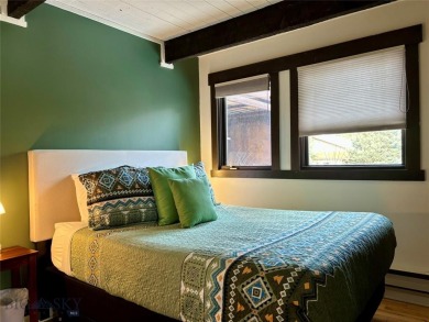 Charming and well-maintained end-unit condo featuring a cozy on Big Sky of Montana Golf Course in Montana - for sale on GolfHomes.com, golf home, golf lot