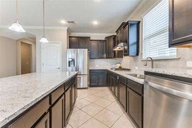 MOVE IN READY.  Immaculate Abbeyville floorplan in Frisco Lakes on Frisco Lakes Golf Course in Texas - for sale on GolfHomes.com, golf home, golf lot