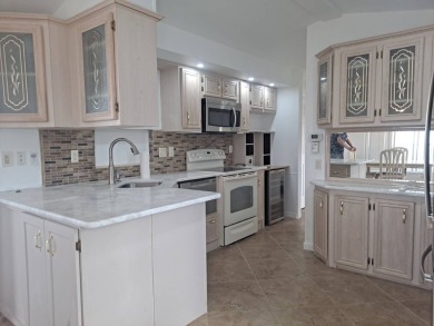 BRAND NEW RENOVATION ! New Kitchen , All Fixtures Including on Riverwood Golf Club in Florida - for sale on GolfHomes.com, golf home, golf lot