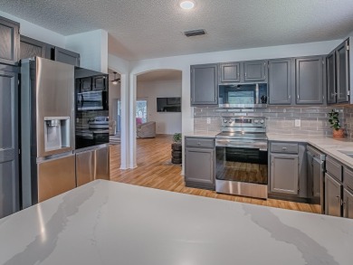 BOND PAID! Welcome to this stunning 3 Bedroom, 2 Bathroom home on El Diablo Executive Golf Course in Florida - for sale on GolfHomes.com, golf home, golf lot
