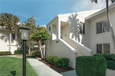 Wonderful Lake Views from this second floor 2 bedroom 2 bath on Club at Pelican Bay Golf Course in Florida - for sale on GolfHomes.com, golf home, golf lot