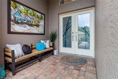 Step into over 2,100 square feet of beautifully remodeled luxury on Olde Hickory Golf and Country Club in Florida - for sale on GolfHomes.com, golf home, golf lot