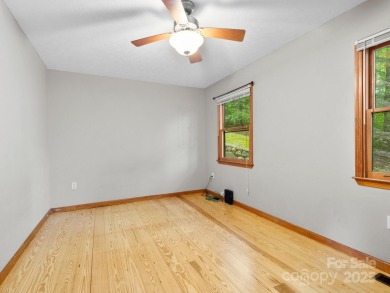 This charming mountain getaway is in the sought after on Waynesville Country Club Inn in North Carolina - for sale on GolfHomes.com, golf home, golf lot