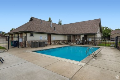 Welcome to your charming mid-unit townhouse in Sandy, perfectly on River Oaks Golf Course in Utah - for sale on GolfHomes.com, golf home, golf lot