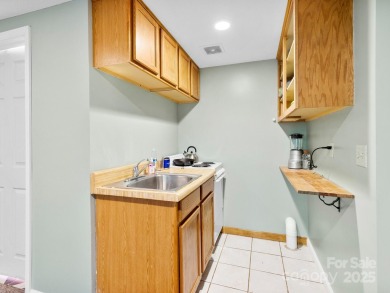 This charming mountain getaway is in the sought after on Waynesville Country Club Inn in North Carolina - for sale on GolfHomes.com, golf home, golf lot