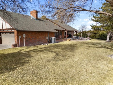 Welcome to INDIAN HILLS! Golfers - this exquisite tudor style on Sunset Hills Golf Course in Oklahoma - for sale on GolfHomes.com, golf home, golf lot