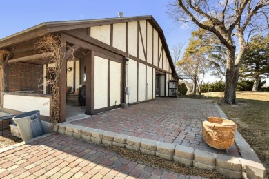 Welcome to INDIAN HILLS! Golfers - this exquisite tudor style on Sunset Hills Golf Course in Oklahoma - for sale on GolfHomes.com, golf home, golf lot