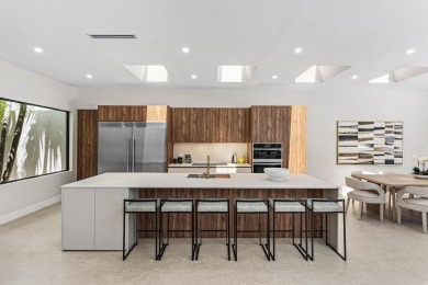 Welcome to this beautifully brand-new, reimagined residence on Polo Club of Boca Raton in Florida - for sale on GolfHomes.com, golf home, golf lot