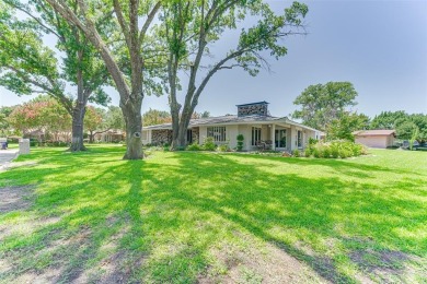 Stunning timeless Mid Century Modern custom in the heart of on Brookhaven Country Club - Golf Course in Texas - for sale on GolfHomes.com, golf home, golf lot