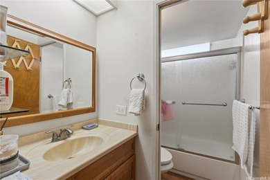 Breezy end/corner unit with golf course views near Pearlridge! on Pearl Country Club in Hawaii - for sale on GolfHomes.com, golf home, golf lot