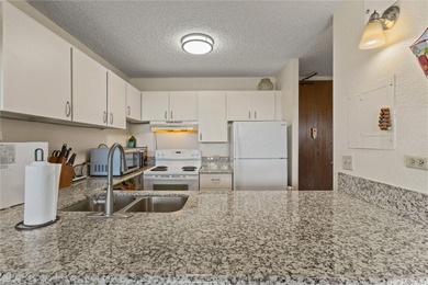 Breezy end/corner unit with golf course views near Pearlridge! on Pearl Country Club in Hawaii - for sale on GolfHomes.com, golf home, golf lot