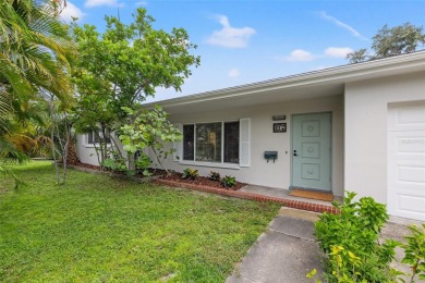 Tropical oasis in Northeast Park Shores! Two bedroom, two bath on The Renaisssance Vinoy Golf Club in Florida - for sale on GolfHomes.com, golf home, golf lot