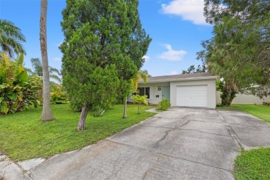 Tropical oasis in Northeast Park Shores! Two bedroom, two bath on The Renaisssance Vinoy Golf Club in Florida - for sale on GolfHomes.com, golf home, golf lot
