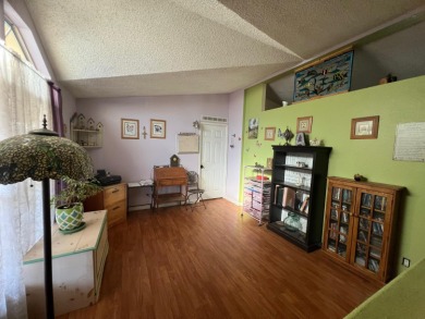 This home has three bedrooms, two bathrooms, a family room and a on The Club at Copper Valley Golf Course in California - for sale on GolfHomes.com, golf home, golf lot