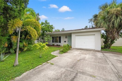 Tropical oasis in Northeast Park Shores! Two bedroom, two bath on The Renaisssance Vinoy Golf Club in Florida - for sale on GolfHomes.com, golf home, golf lot
