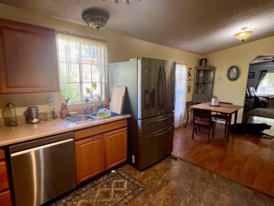 This home has three bedrooms, two bathrooms, a family room and a on The Club at Copper Valley Golf Course in California - for sale on GolfHomes.com, golf home, golf lot