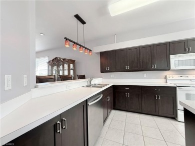 End unit 2 Bedroom + Den Condo - Highly sought after floor plan on Naples Heritage Golf and Country Club in Florida - for sale on GolfHomes.com, golf home, golf lot