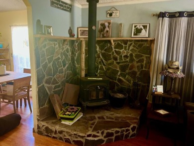 This home has three bedrooms, two bathrooms, a family room and a on The Club at Copper Valley Golf Course in California - for sale on GolfHomes.com, golf home, golf lot
