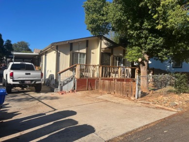 This home has three bedrooms, two bathrooms, a family room and a on The Club at Copper Valley Golf Course in California - for sale on GolfHomes.com, golf home, golf lot