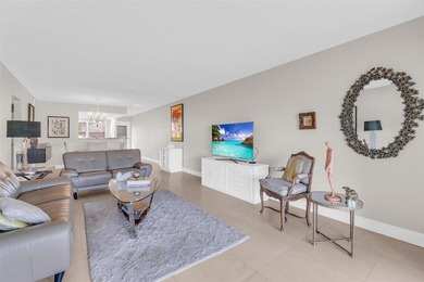 Discover this beautifully remodeled residence where elegance on Wynmoor Golf Course in Florida - for sale on GolfHomes.com, golf home, golf lot