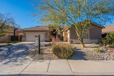 This charming single-level residence features 3 spacious on Augusta Ranch Golf Club in Arizona - for sale on GolfHomes.com, golf home, golf lot