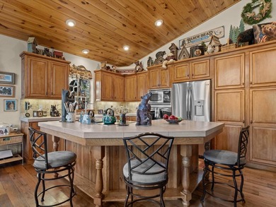 This beautifully furnished home, perfect for immediate enjoyment on Whitehawk Ranch Golf Club in California - for sale on GolfHomes.com, golf home, golf lot