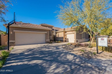 This charming single-level residence features 3 spacious on Augusta Ranch Golf Club in Arizona - for sale on GolfHomes.com, golf home, golf lot