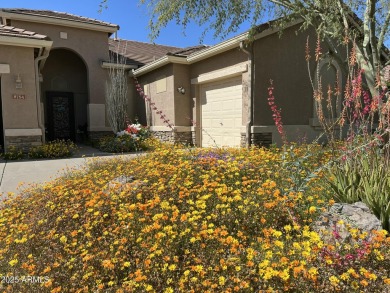 This charming single-level residence features 3 spacious on Augusta Ranch Golf Club in Arizona - for sale on GolfHomes.com, golf home, golf lot