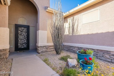 This charming single-level residence features 3 spacious on Augusta Ranch Golf Club in Arizona - for sale on GolfHomes.com, golf home, golf lot