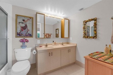 Discover this beautifully remodeled residence where elegance on Wynmoor Golf Course in Florida - for sale on GolfHomes.com, golf home, golf lot