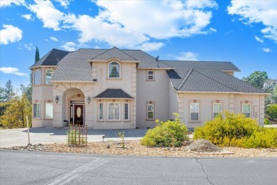 Lakefront living at its absolute finest! Stunning, custom-built on The Club at Copper Valley Golf Course in California - for sale on GolfHomes.com, golf home, golf lot