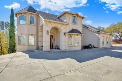 Lakefront living at its absolute finest! Stunning, custom-built on The Club at Copper Valley Golf Course in California - for sale on GolfHomes.com, golf home, golf lot