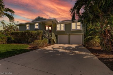 Welcome to 14148 Sandarac Dr, Bokeelia, FL--a beautifully on Alden Pines Golf Club in Florida - for sale on GolfHomes.com, golf home, golf lot