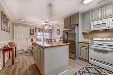 This charming first-floor condo offers easy access to a pool on  in South Carolina - for sale on GolfHomes.com, golf home, golf lot