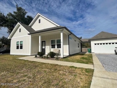 This custom built Benfatti Construction home in Bay St. Louis is on The Bridges Golf Club At Hollywood Casino in Mississippi - for sale on GolfHomes.com, golf home, golf lot