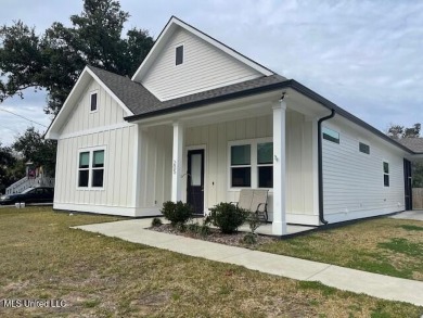 This custom built Benfatti Construction home in Bay St. Louis is on The Bridges Golf Club At Hollywood Casino in Mississippi - for sale on GolfHomes.com, golf home, golf lot