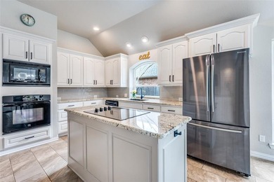 Welcome home to this beautifully updated home with a backyard on Oakmont Country Club in Texas - for sale on GolfHomes.com, golf home, golf lot