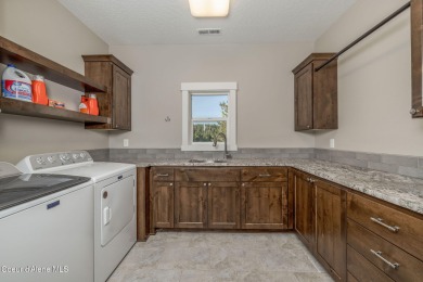 Welcome to your dream lakefront retreat in the sought-after on Stoneridge Golf Club in Idaho - for sale on GolfHomes.com, golf home, golf lot